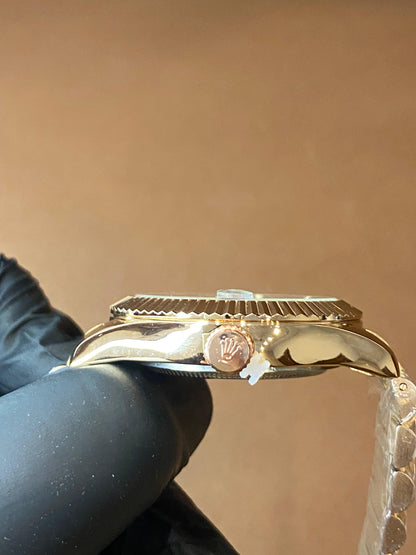 ROLEX ROSE GOLD DAY N DATE